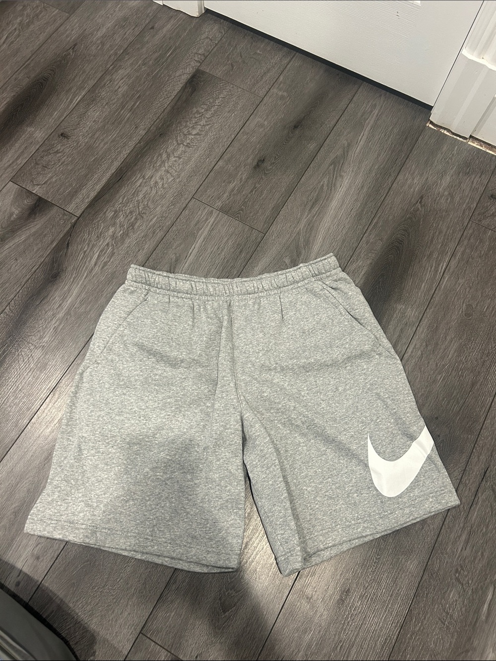 Nike Light Gray Shorts with White Swoosh